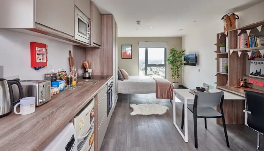 Kitchen bed desk and chairs student studio apartment at Trinity View Coventry in Coventry Student Accommodation